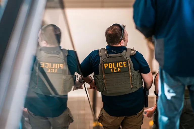 Federal immigration agents walk through Terminal A at Newark International Airport in New Jersey, Tuesday, March 24, 2026. (AP Photo/Eduardo Munoz Alvarez)