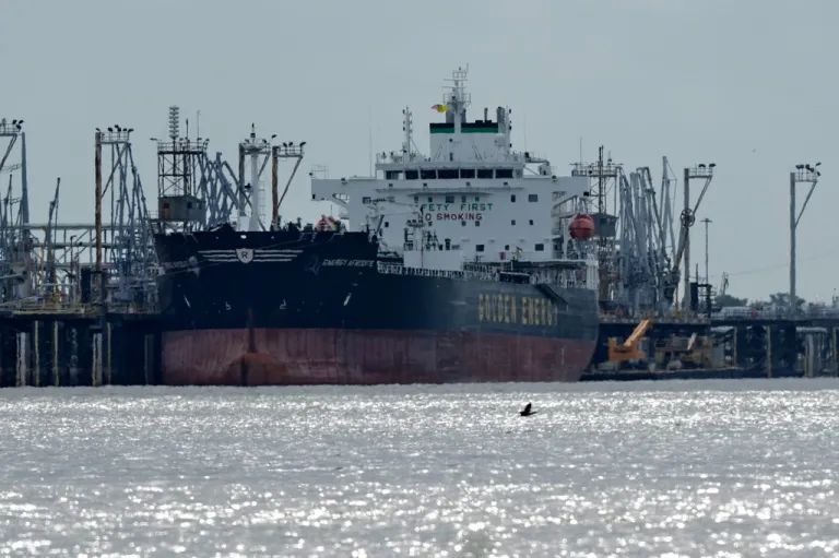 The oil/chemical tanker Energy Afrodite is moored at the Norco Refining Company in Norco, La., Thursday, April 2, 2026. (AP Photo/Gerald Herbert)