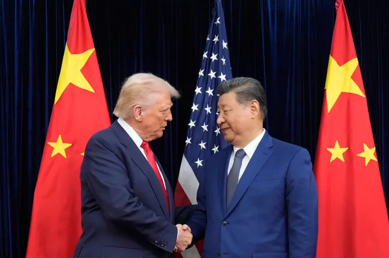President Donald Trump and Chinese President Xi Jinping shake hands before their meeting at Gimhae International Airport in Busan, South Korea, Oct. 30, 2025.