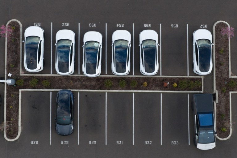 Tesla's parked at a parking lot