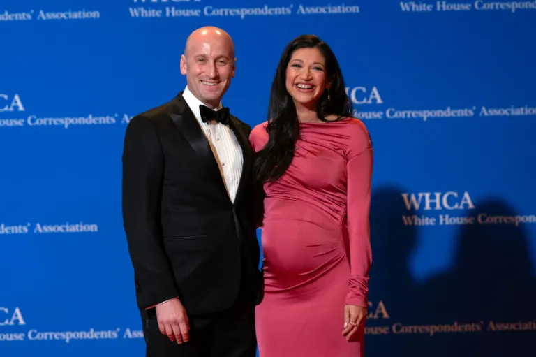 White House deputy chief of staff Stephen Miller and Katie Miller pose for photographers as they arrives at the annual White House Correspondents' Association Dinner in Washington, Saturday, April 25, 2026. (AP Photo/Jose Luis Magana)