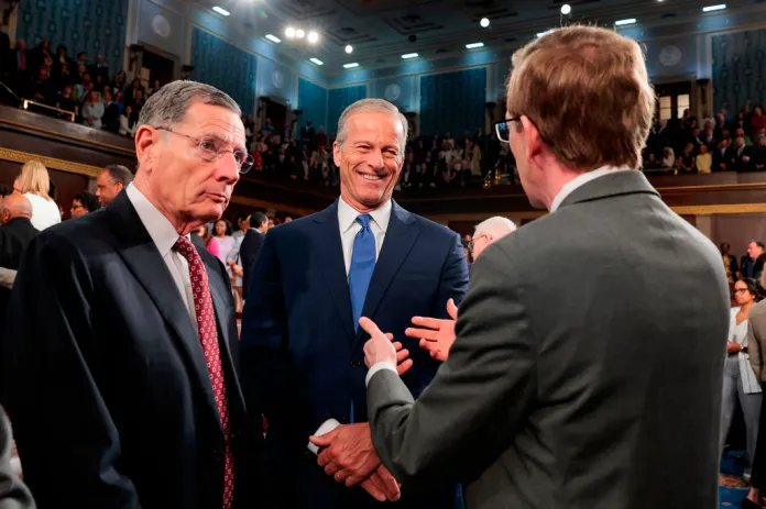 Senate Majority Leader John Thune, R-S.D., and Sen. John Barrasso, R-Wyo., arrive to hear Britain's King Charles III speak to a joint meeting of Congress in the House Chamber at the U.S. Capitol, Tuesday, April 28, 2026