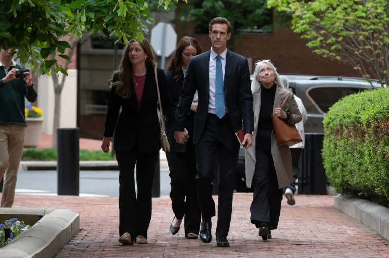 Former FBI Director James Comey arrives with family members, at the federal courthouse in Alexandria, Virginia, on April 29, 2026.