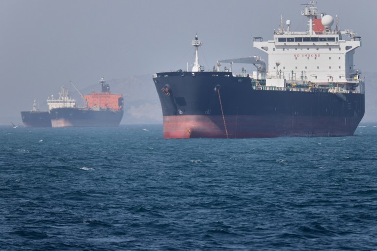 Oil tankers sit at anchor offshore in the Strait of Hormuz off Bandar Abbas, Iran, Saturday, May 2, 2026.