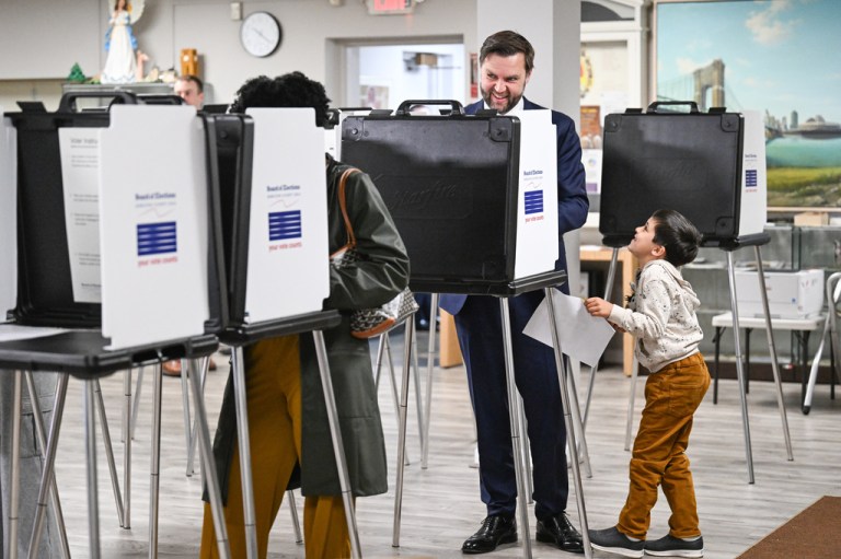 JD Vance and his son casting a ballot in Ohio