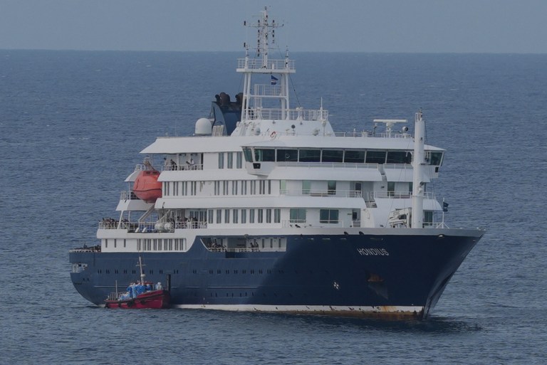 The MV Hondius cruise ship is anchored at a port in Praia, Cape Verde, Wednesday, May 6, 2026. (AP Photo/Misper Apawu)