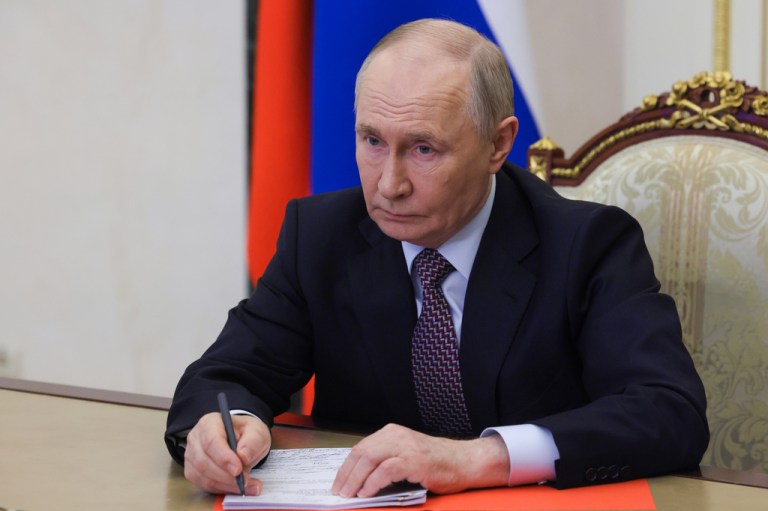 Russian President Vladimir Putin chairs a meeting with members of the Security Council via videoconference at the Kremlin in Moscow, Russia, Friday, May 8, 2026.