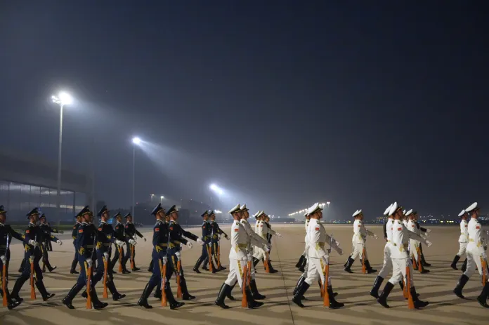 An honor guards moves into place for an arrival ceremony as President Donald Trump arrives on Air Force One, Wednesday, May 13, 2026, at Beijing Capital International Airport in Beijing. (AP Photo/Mark Schiefelbein)