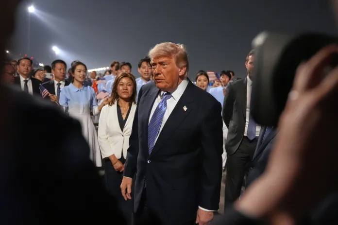 President Donald Trump walks during a welcome ceremony as he arrives on Air Force One, Wednesday, May 13, 2026, at Beijing Capital International Airport in Beijing. (AP Photo/Mark Schiefelbein)