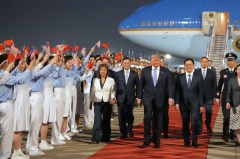 China rolls out the red carpet, American flags, and military honor guard for Trump’s arrival in Beijing