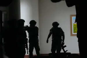 Gunfire breaks out in Philippine Senate where authorities have tried to arrest a senator