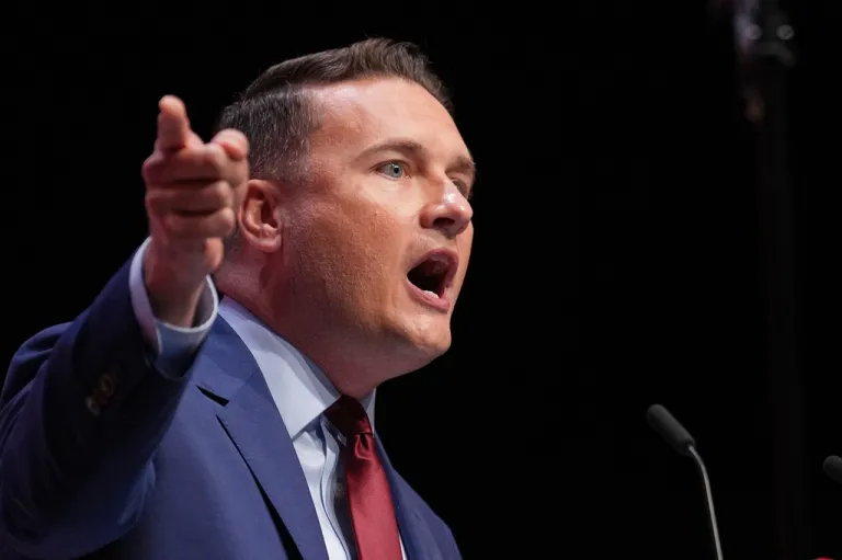 Britain's then Heath Secretary Wes Streeting gestures as he speaks during the annual Labour Party conference in Liverpool, England, Tuesday, Sept. 30, 2025.