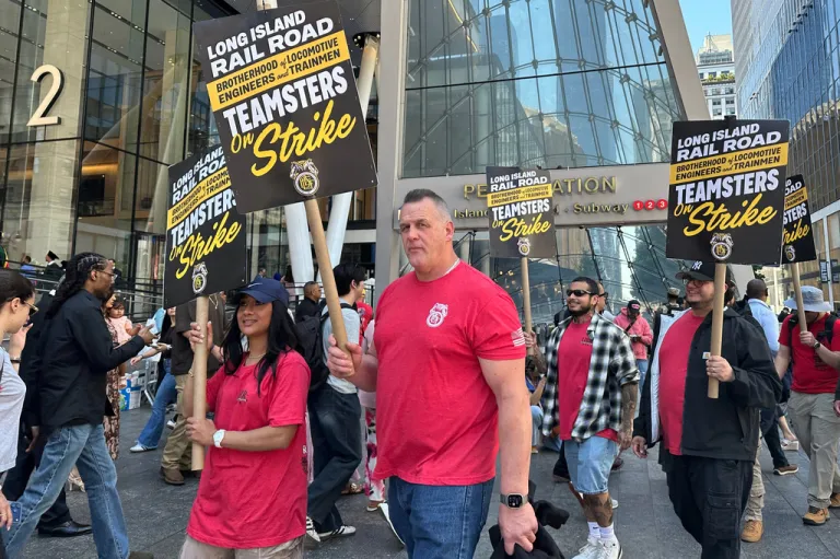 Long Island Rail Road workers, including locomotive engineer Karl Bischoff, center, picket outside Penn Station on the first day of a strike.