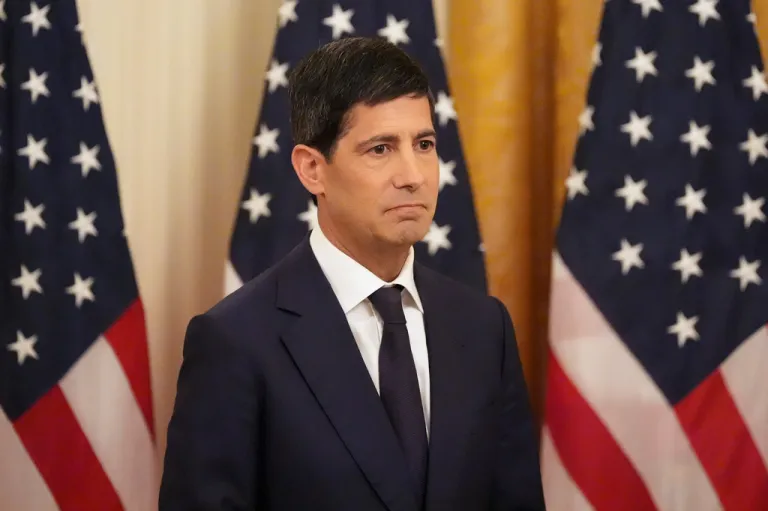 Kevin Warsh listens as President Donald Trump speaks during Warsh's swearing in as Chairman of the Federal Reserve in the East Room of the White House, Friday, May 22, 2026, in Washington.