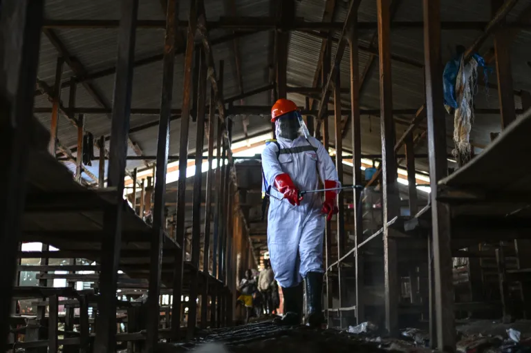 A sanitation worker in Bunia, Congo, amid the 2026 Ebola outbreak.