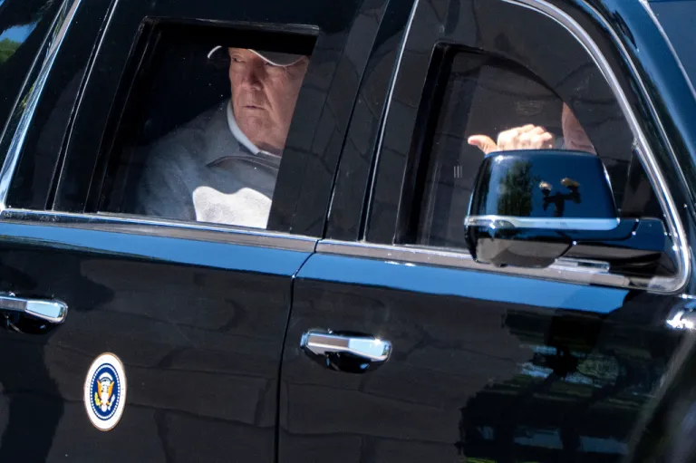 President Donald Trump looks out the window of his limousine at the construction in Lafayette Park as he departs the White House, Saturday, May 30, 2026, in Washington. (AP Photo/Alex Brandon)
