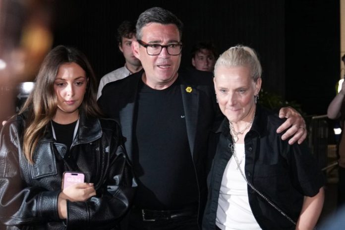Labour party's Andy Burnham leaves with his wife Marie-France Van Heel and their daughter Rosie after winning the Makerfield by-election, paving the way for a leadership challenge against Prime Minister Sir Keir Starmer. in Wigan, England, Friday, June 19, 2026.