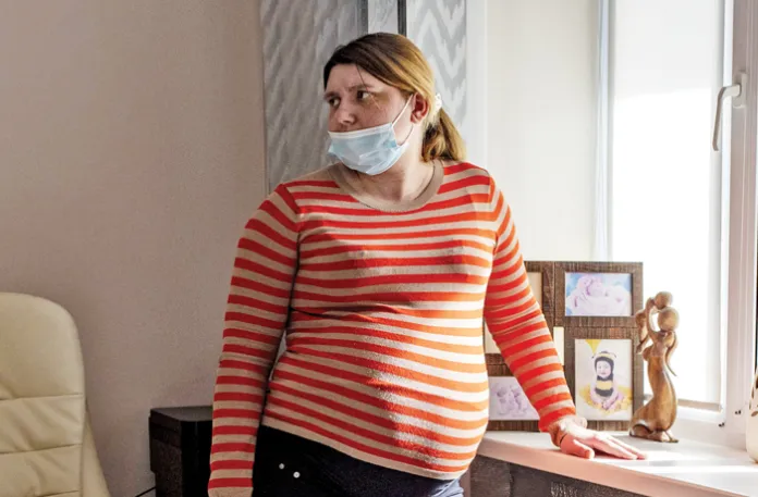Nastya, a Ukrainian woman serving as a surrogate, waits in a home for surrogates in Kyiv, Ukraine, during the last few weeks before her due date, March 1, 2024. (Gian Marco Benedetto/Anadolu/Getty)
