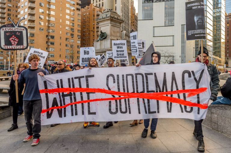 On December 3, Peoples Power Assemblies called for a rally and march at Columbus Circle to protest the continual rise of white supremacy with the election of Donald Trump. (Photo by Erik McGregor/LightRocket via Getty Images)