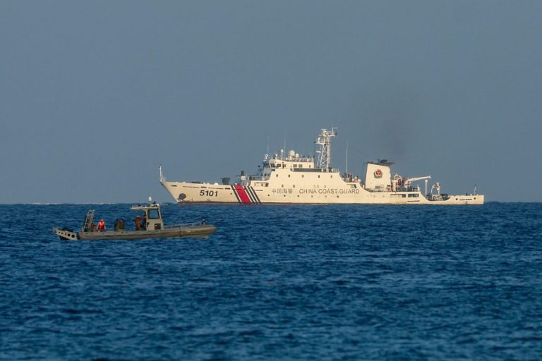 A Philippine Marine speedboat patrols off the coast of Manila-ruled Thitu Island while a China Coast Guard vessel nears it, in the disputed South China Sea, on May 3, 2026. The Philippine-ruled Thitu Island, also known as Pagasa, is part of the Spratly Island groups in the South China Sea, disputed by neighboring countries including Beijing, Manila and Vietnam. Recent reports have shown that China has significantly increased its People's Liberation Army and Coast Guard presence in the contested waters. United States and other nations have issued statements in response to actions that fueled geopolitical tensions in the region. (Photo by Daniel Ceng/Anadolu via Getty Images)