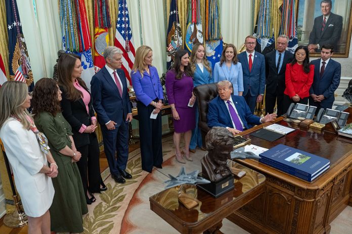 President Donald Trump, center right, speaks during a maternal healthcare event in the Oval Office of the White House in Washington, DC, US, on Monday, May 11, 2026. The Trump administration launched the website Moms.gov on Mother's Day, to address the needs of mothers and fathers who face difficult or unexpected pregnancies. Photographer: Aaron Schwartz/Sipa/Bloomberg via Getty Images