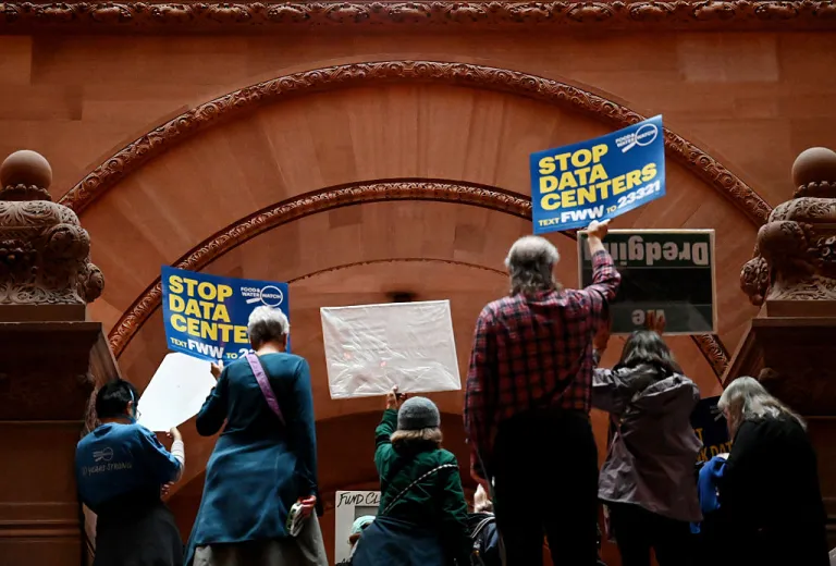 Environmental advocates and progressive lawmakers hold a rally in support of legislation that would put a moratorium on new data centers in the state on Wednesday, May 13, 2026, at the Capitol in Albany, N.Y. (Will Waldron/Albany Times Union via Getty Images)