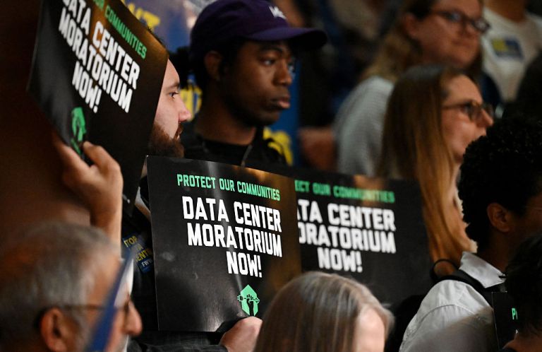 Environmental advocates and progressive lawmakers hold a rally in support of legislation that would put a moratorium on new data centers in the state on Wednesday, May 13, 2026, at the Capitol in Albany, N.Y. (Will Waldron/Albany Times Union via Getty Images)