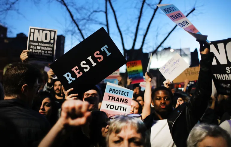 Hundreds protest a Trump administration announcement this week that rescinds an Obama-era order allowing transgender students to use school bathrooms matching their gender identities, at the Stonewall Inn on February 23, 2017 in New York City. Activists and members of the transgender community gathered outside the historic LGTB bar to denounce the new policy. (Photo by Spencer Platt/Getty Images)