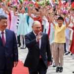 China’s Xi and Russia’s Putin talk energy, ‘law of jungle’ in summit in Beijing