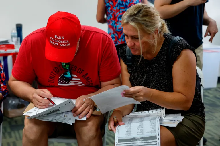 Riverside County residents fill out their primary election ballots.