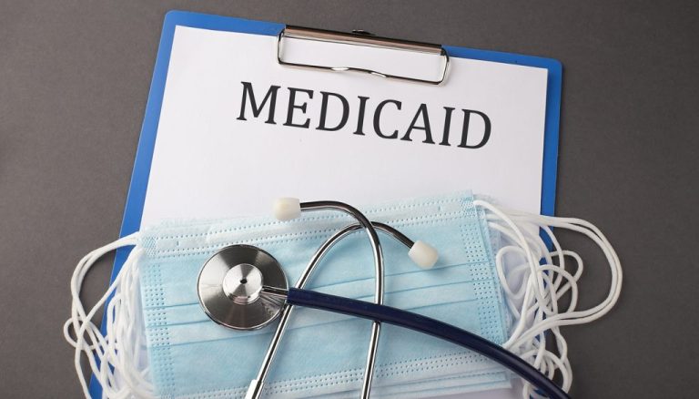 A Getty Images illustration of Medicaid forms.