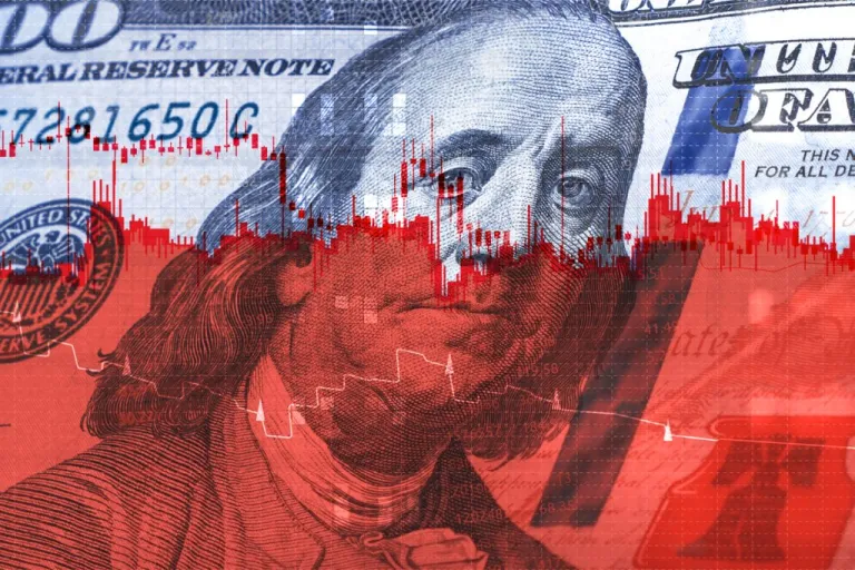 A smeared 100 dollar bill with red all over Benjamin Franklin's chin represents the Right's poor flip-flopping tax policy. (Getty Images)