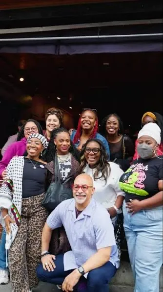 Rep. Summer Lee (D-PA) and Pennsylvania state Rep. Chris Rabb pose in a group photo