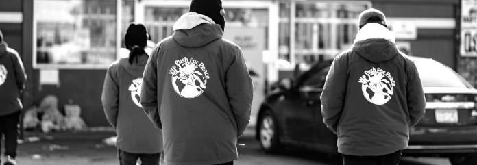 Community engagers out on patrol. (WePushforPeace.org)