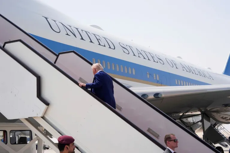 Trump boards Air Force One.
