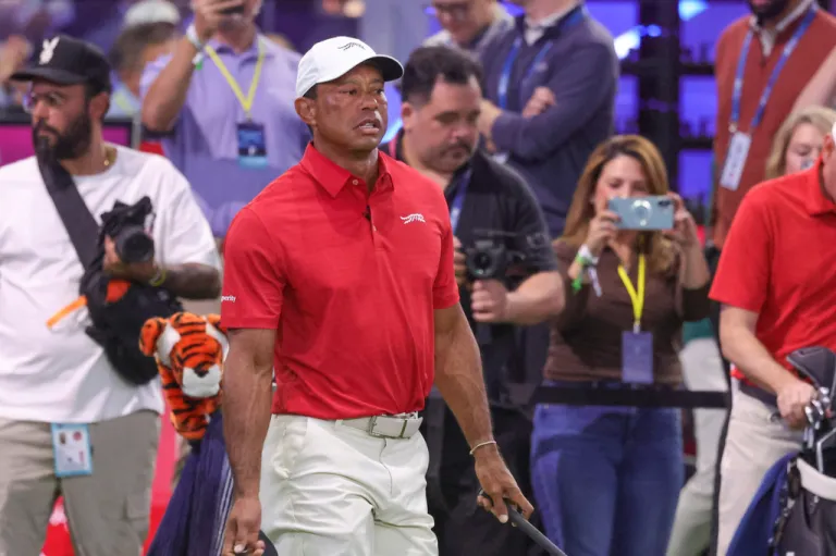Tiger Woods of the Jupiter Links Golf Club walks on the course before the match.