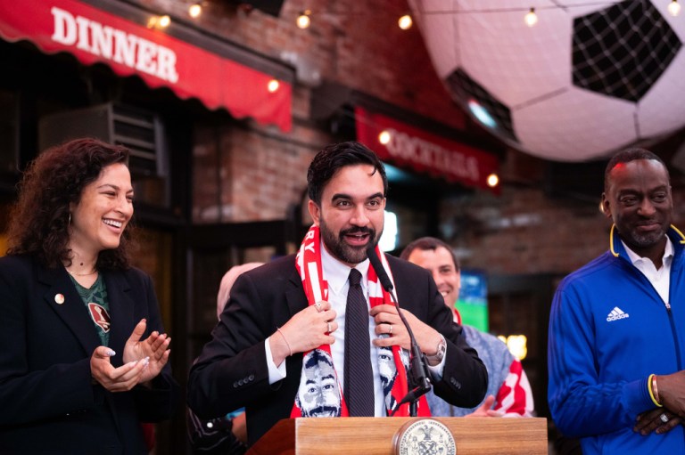 New York Mayor Zohran Mamdani wears a Thierry Henry scarf as he makes a World Cup soccer tournament announcement.