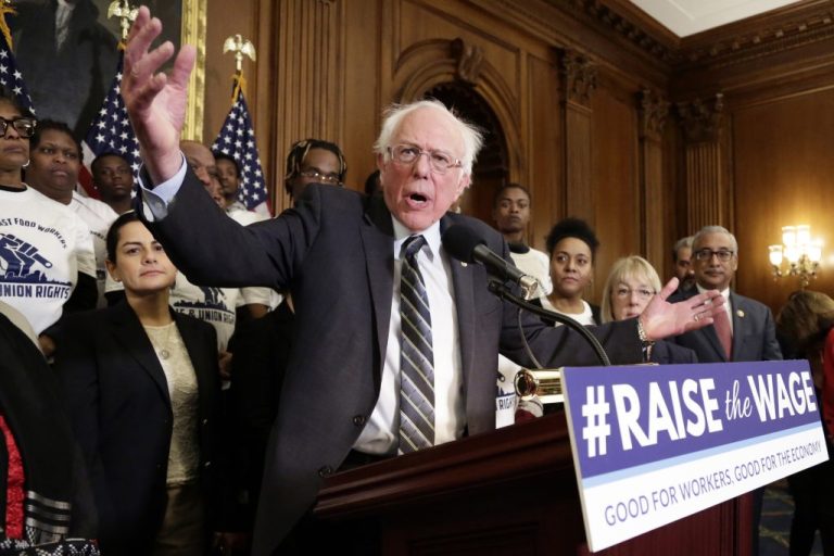 In this 2019 photo, Sen. Bernie Sanders (I-VT) gives his support to a bill to raise the minimum wage to $15.