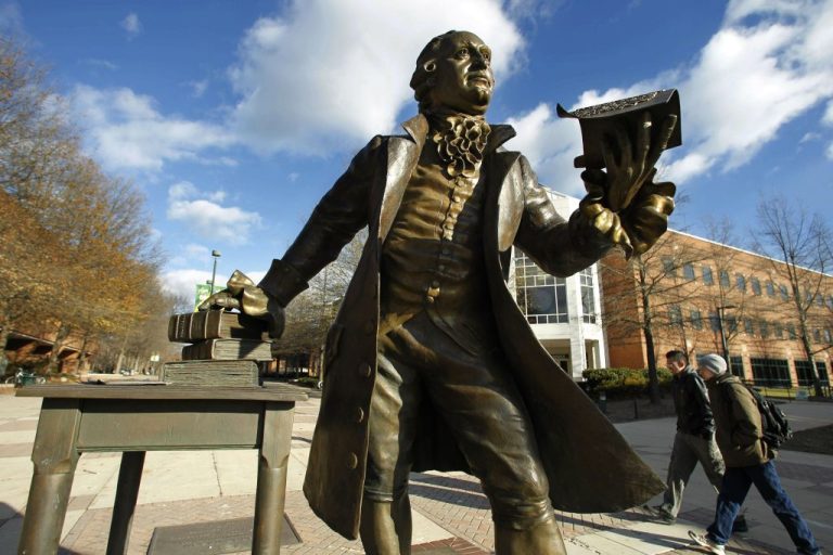 A statue of George Mason stands in the heart of George Mason University's Fairfax campus.