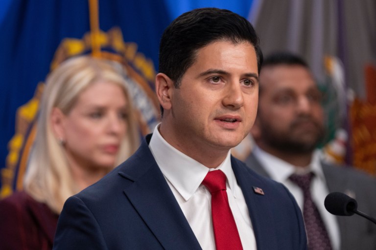 Bill Essayli, acting U.S. Attorney for the Central District of California, speaks with reporters.