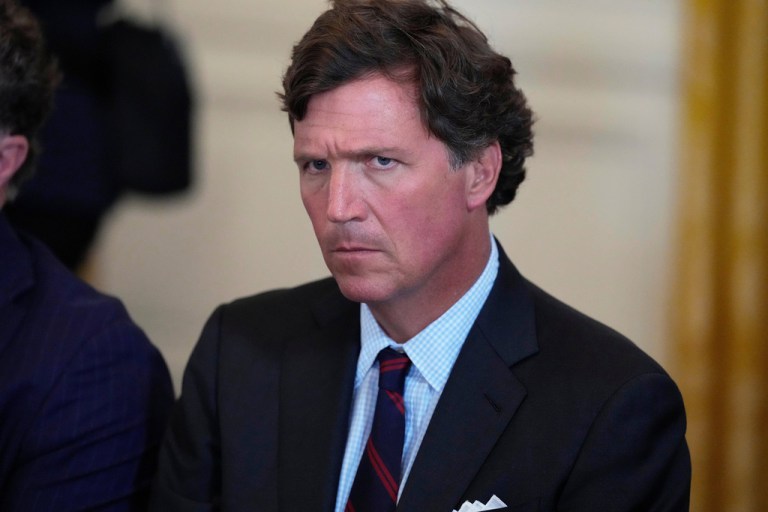Tucker Carlson attends a meeting with President Donald Trump and oil executives in the East Room of the White House on Jan. 9, 2026.
