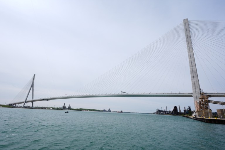 The Godie Howe Bridge is shown under construction.