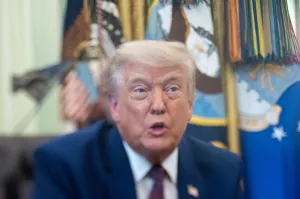 Trump makes a splash with Oval Office chart comparing reflecting pool to skyscrapers