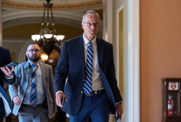 Senate Majority Leader John Thune (R-SD) walks from the chamber to his office