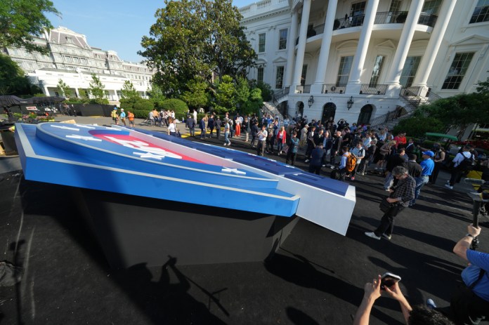 Members of the media tour the arena for the UFC Freedom 250 fights on the South Lawn of the White House, Thursday, June 11, 2026, in Washington. (AP Photo/Alex Brandon)