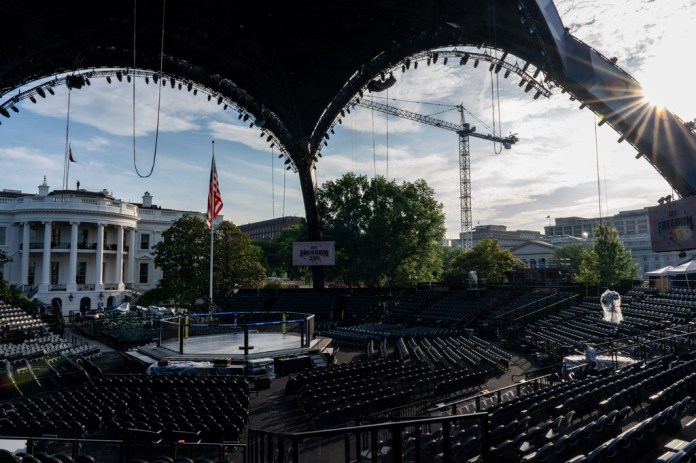 Members of the media view the arena for the UFC Freedom 250 fights on the South Lawn of the White House, Thursday, June 11, 2026, in Washington. (AP Photo/Alex Brandon)