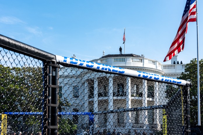 Members of the media view the arena for the UFC Freedom 250 fights on the South Lawn of the White House, Thursday, June 11, 2026, in Washington. (AP Photo/Alex Brandon)