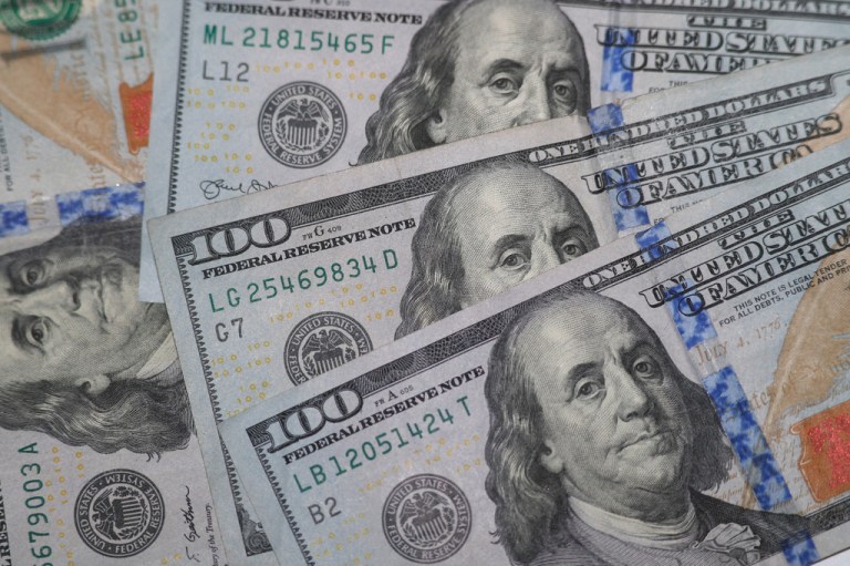 The likeness of Benjamin Franklin is seen on $100 bills in Dallas from this Jan. 22, 2020, file photo. (AP Photo/LM Otero)
