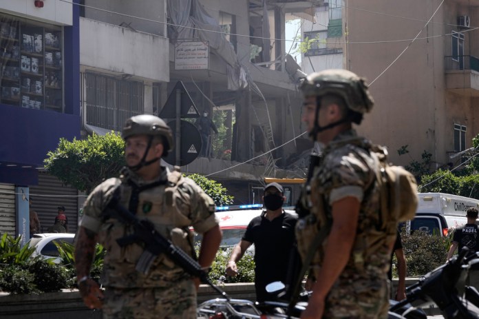 Israel says it targeted Hezbollah in Beirut as Trump looks to secure Iran deal