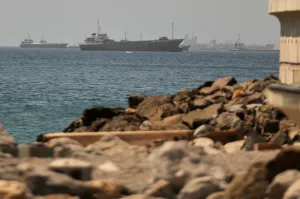 Iran launches drone assault on Bahrain and a ship is hit in Strait of Hormuz as ceasefire frays